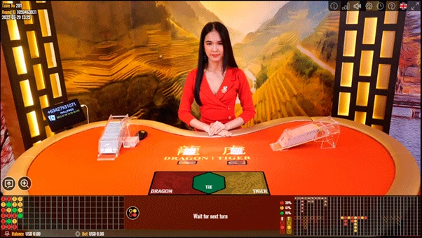 A live dealer in a studio participating in Dragon Tiger